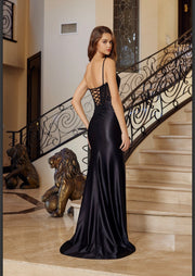 Black satin gown featuring a plunging v neckline