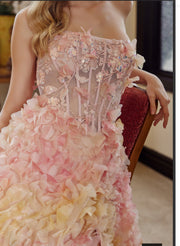 Long tulle ball gown with full flower applique tie back